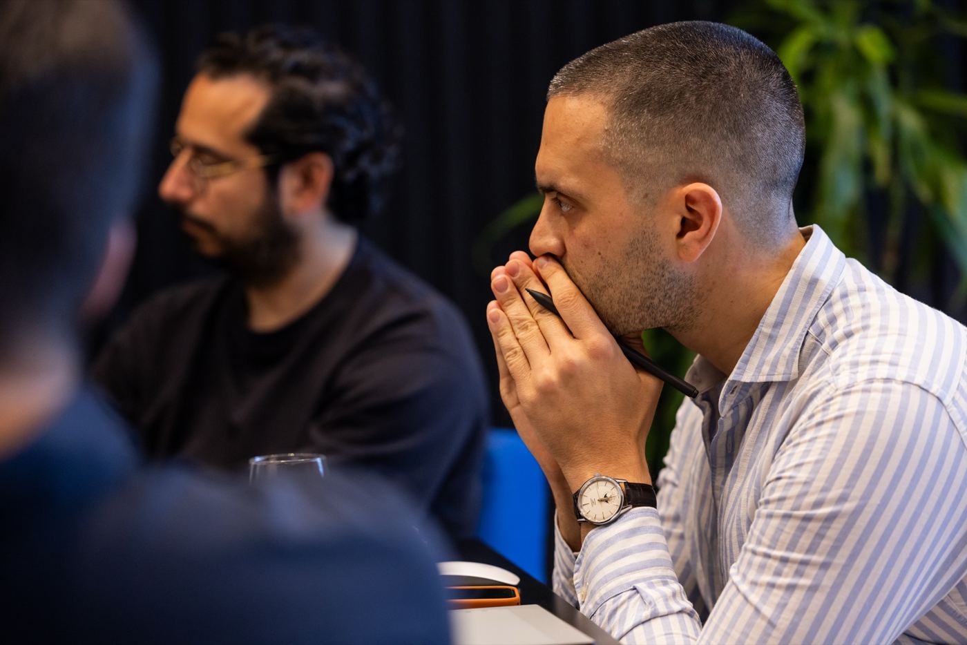 Two participants following the discussion